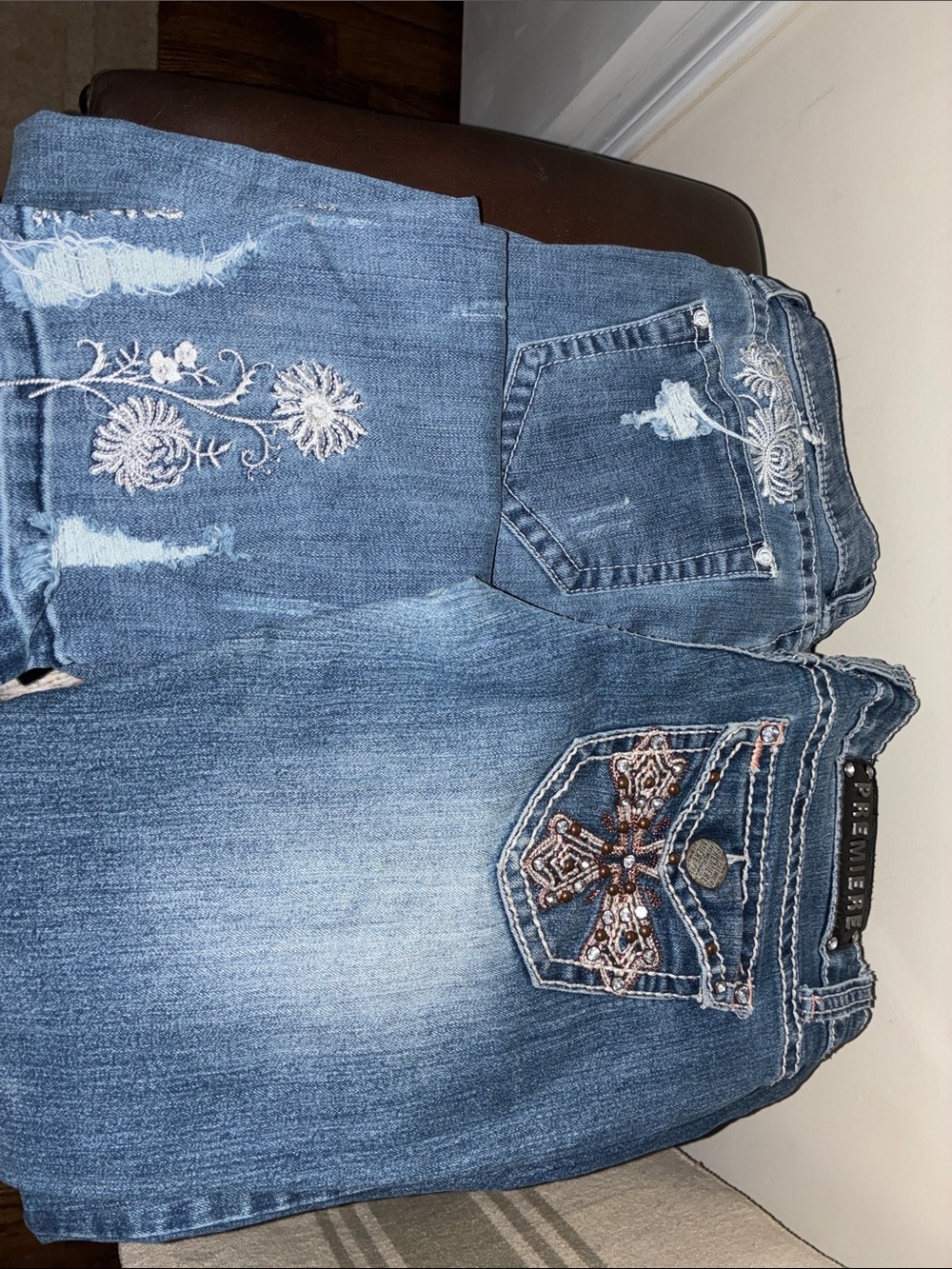 Grace in LA Medium Blue Boot Cut Jeans with Embroidered Cross and Floral Accents